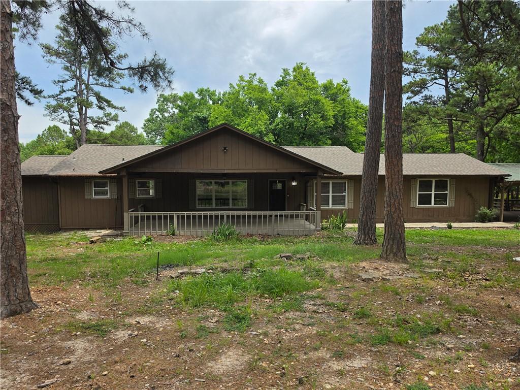 Image 2: Ranch-style exterior featuring a covered front por
