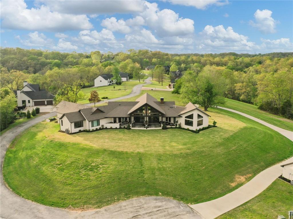 Image 2: Contemporary ranch-style residence featuring a pro