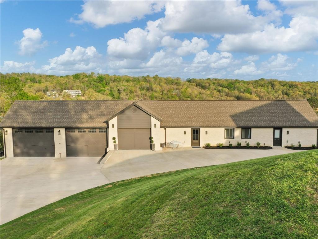 Image 3: Spacious property featuring an expansive concrete