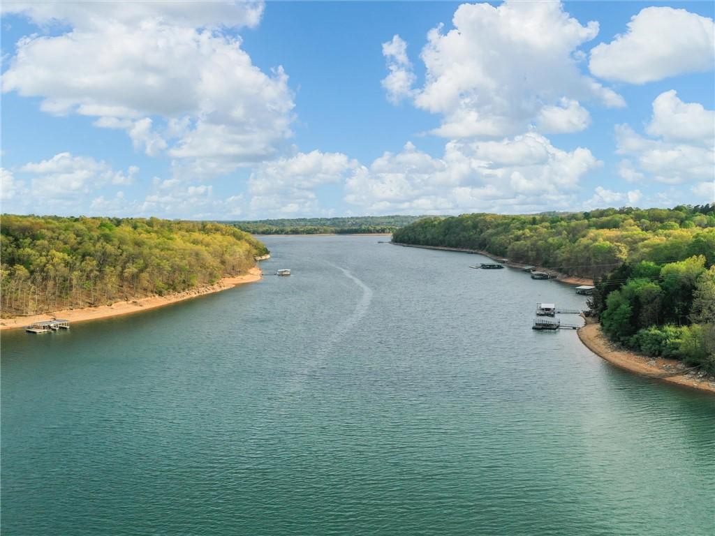 Image 4: Expansive waterfront property featuring a wide bod