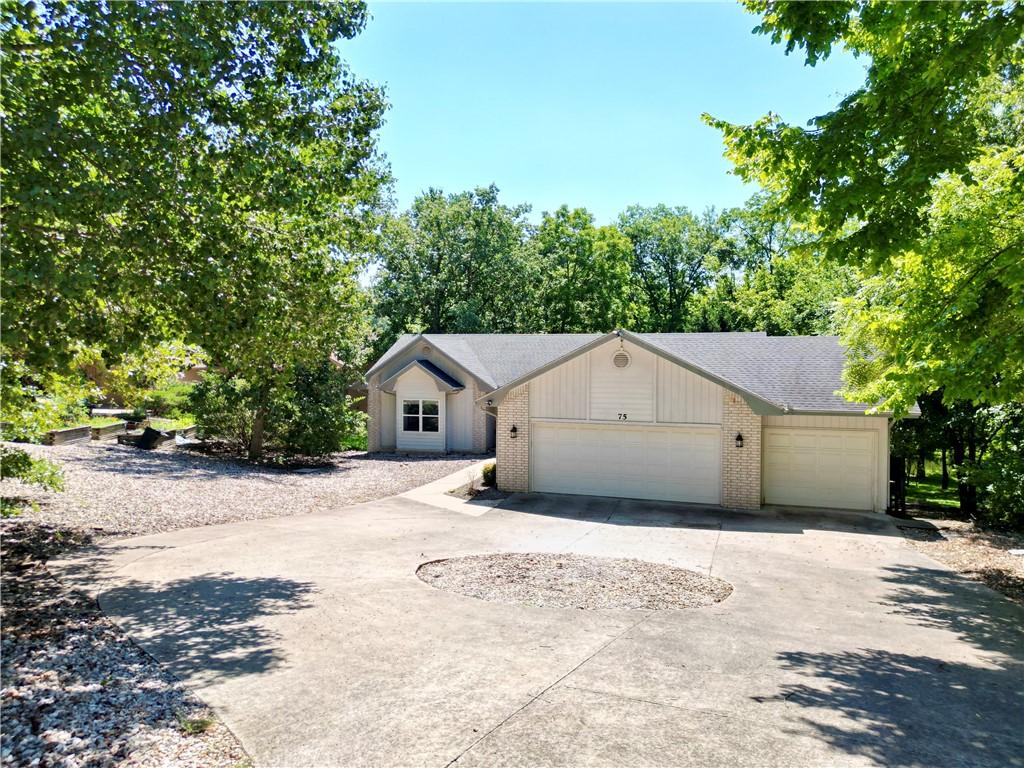 Image 2: 3 car garage with level entry to this lake house!
