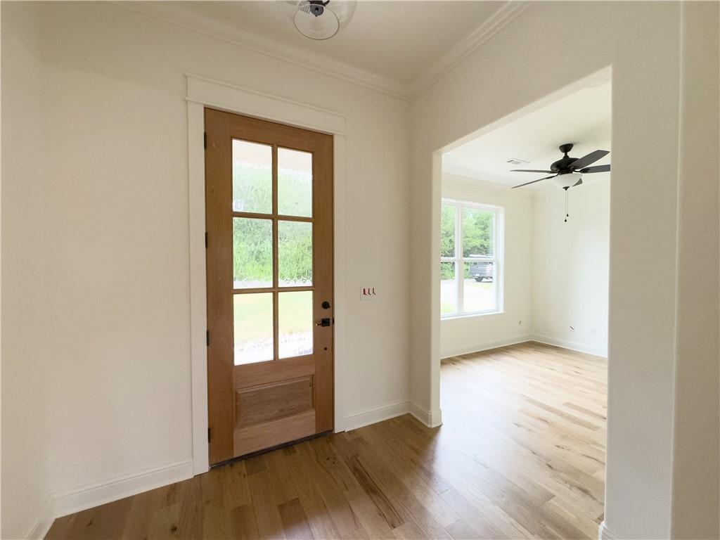 Image 4: Entryway featuring engineered wood finished floors