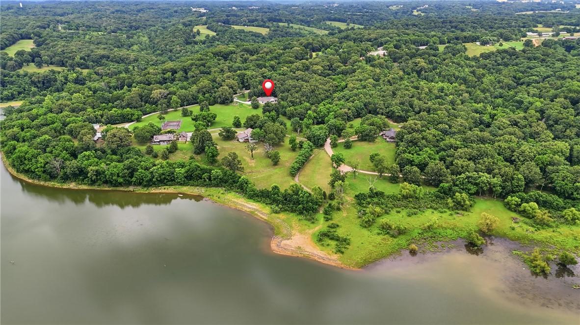 Image 2: Expansive property featuring a large body of water