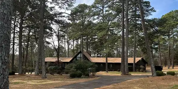 Image 3: View of front of property with driveway and view o