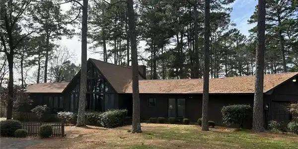 Image 4: View of front of house featuring a chimney