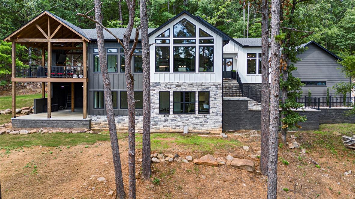 Image 1: Contemporary exterior with mixed material facade,