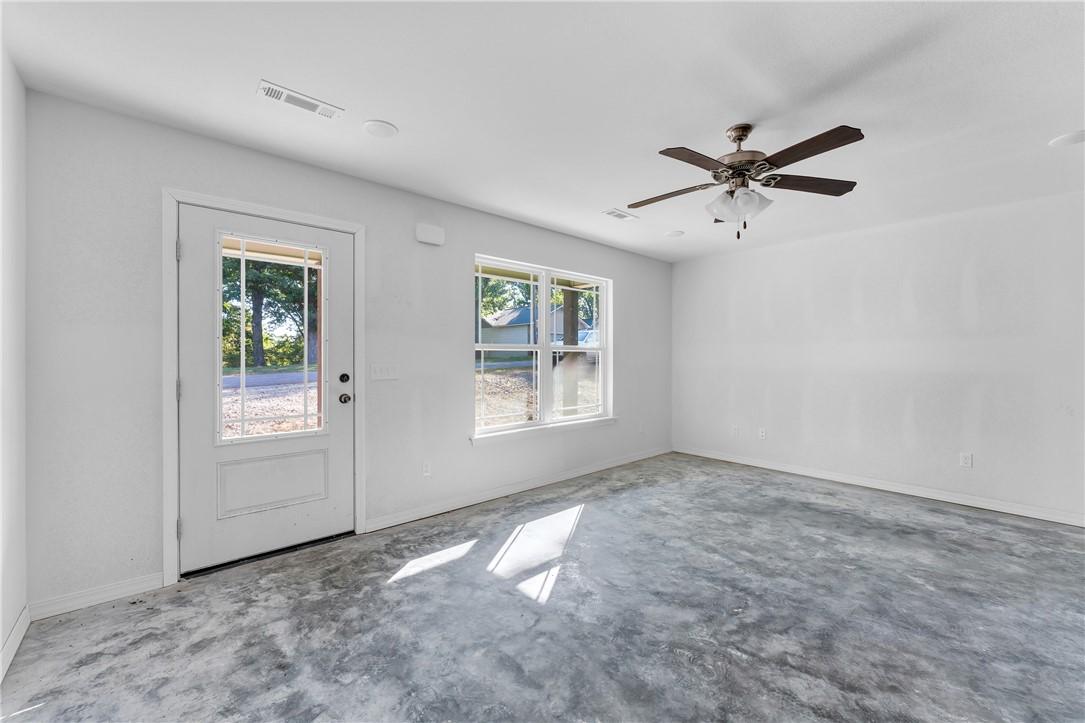 Image 4: Entrance foyer featuring ceiling fan and baseboard