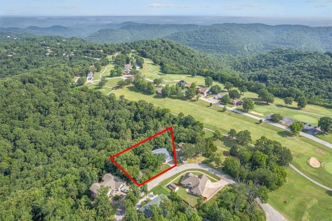 Image 2: Aerial overview of property's location featuring p