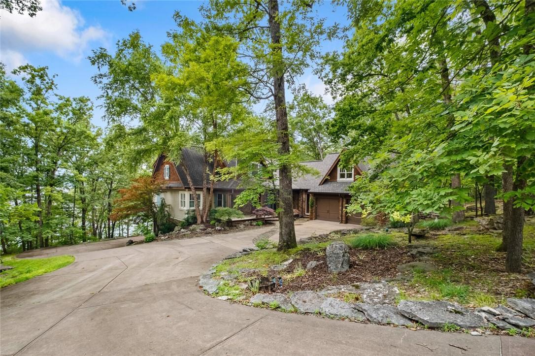 Image 2: Picturesque setting for this lakefront property th