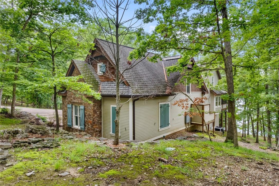 Image 3: Impressive custom Cottage Style home nestled in th