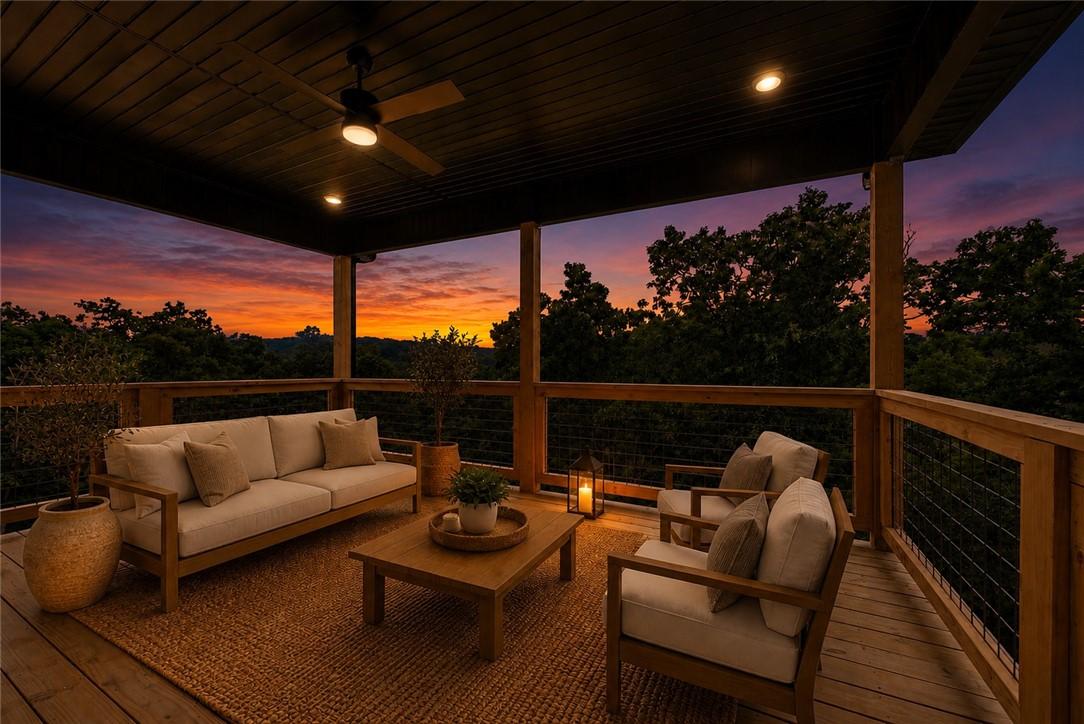 Image 2: Covered outdoor deck with wood-finish flooring, wo