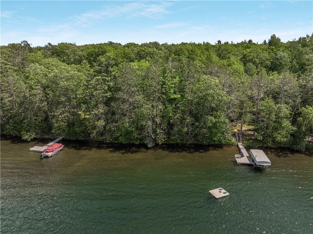 Image 2: Heavily wooded parcel with lower elevation to wate
