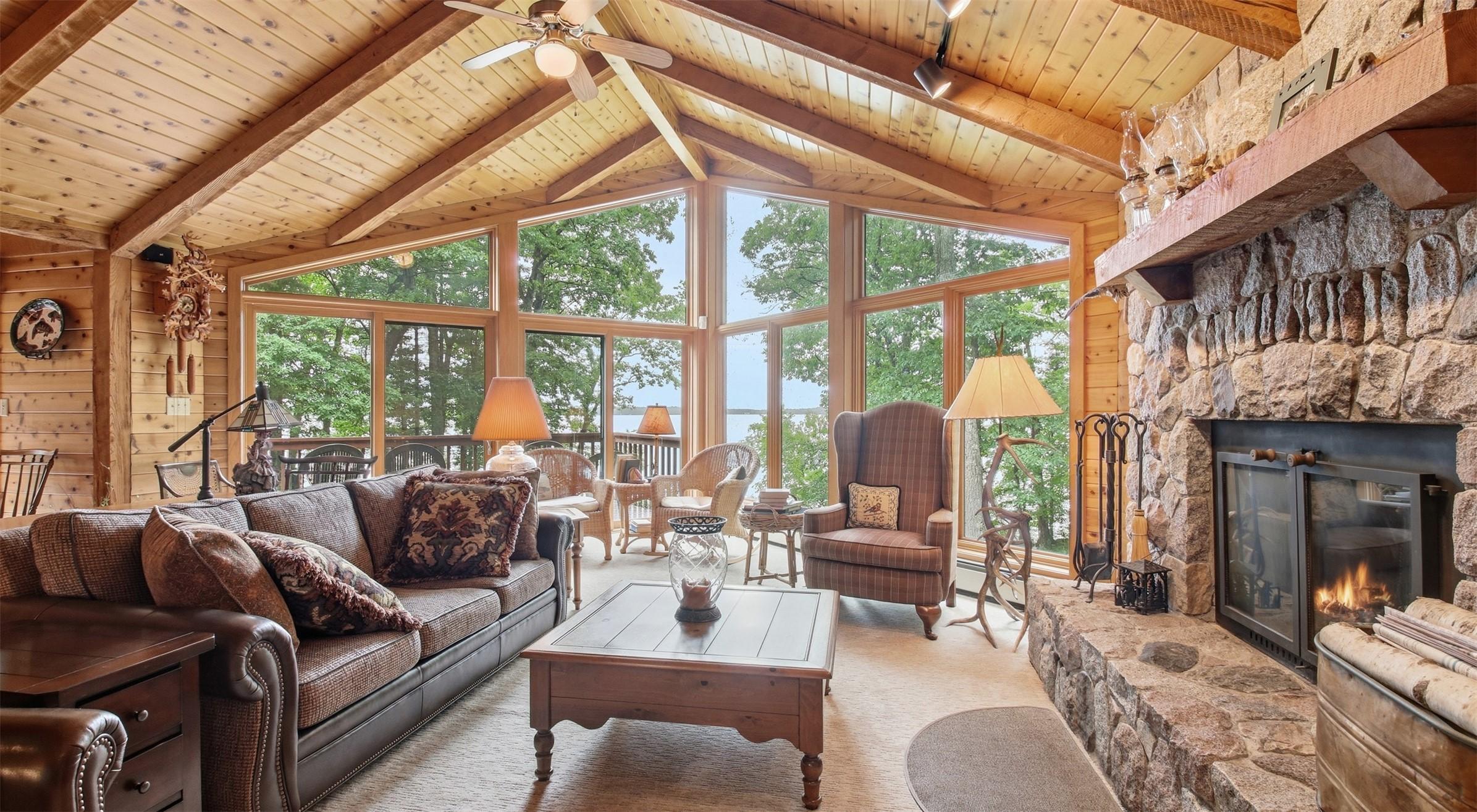 Image 4: Upstairs great room with woodburning fireplace