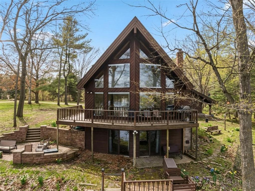 Image 1: Front of home with snow virtaully removed