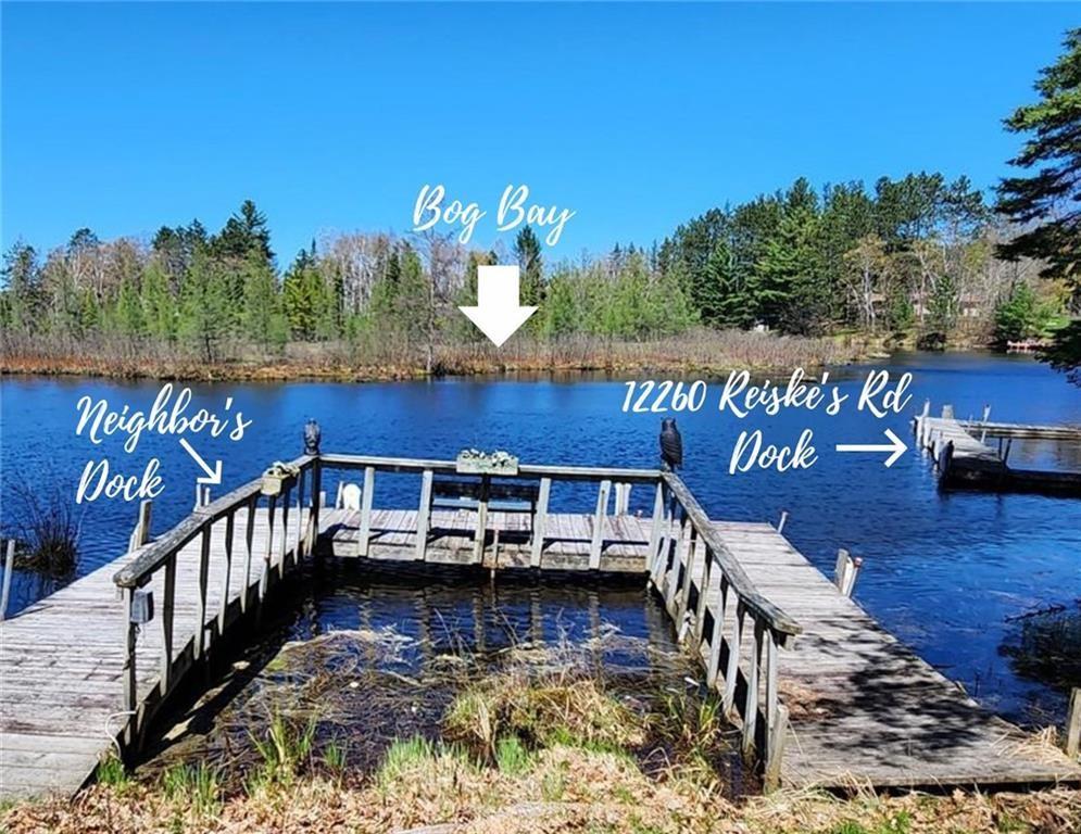 Image 3: Neighbors dock shows the water shoreline which is
