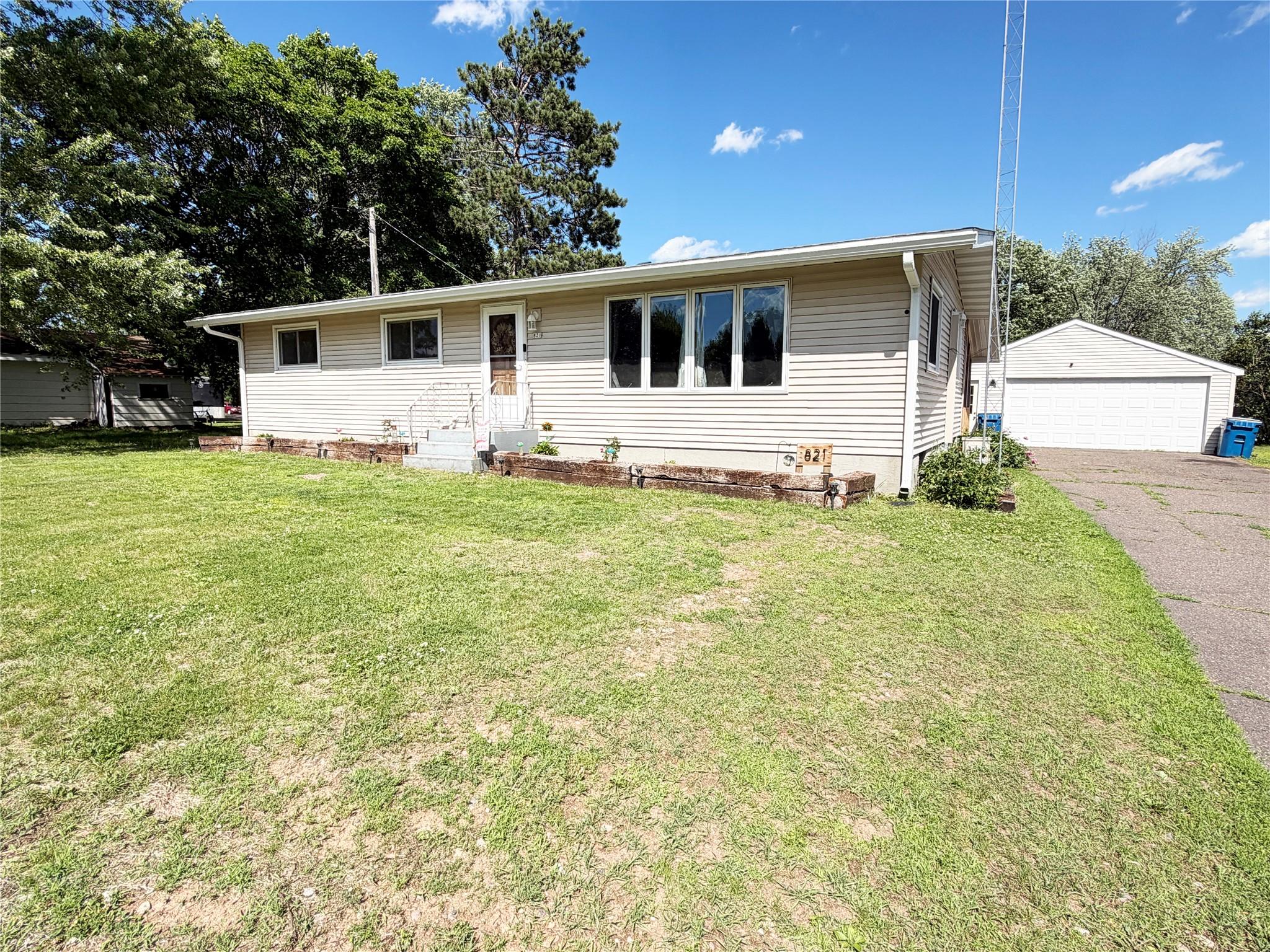 Image 1: Front Of Home with 2 car detached garage