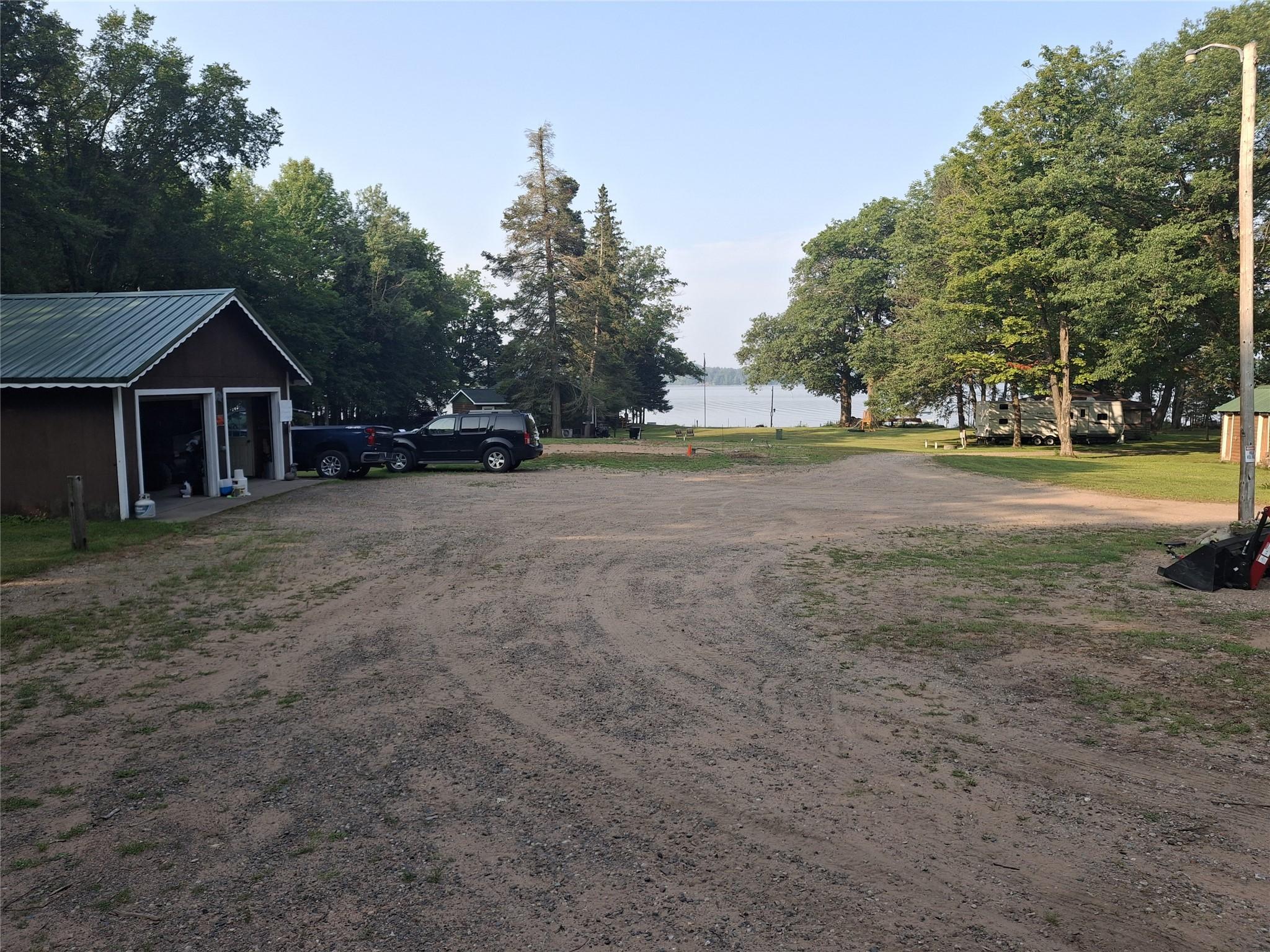 Image 2: Garage and view of Lost Land Lake