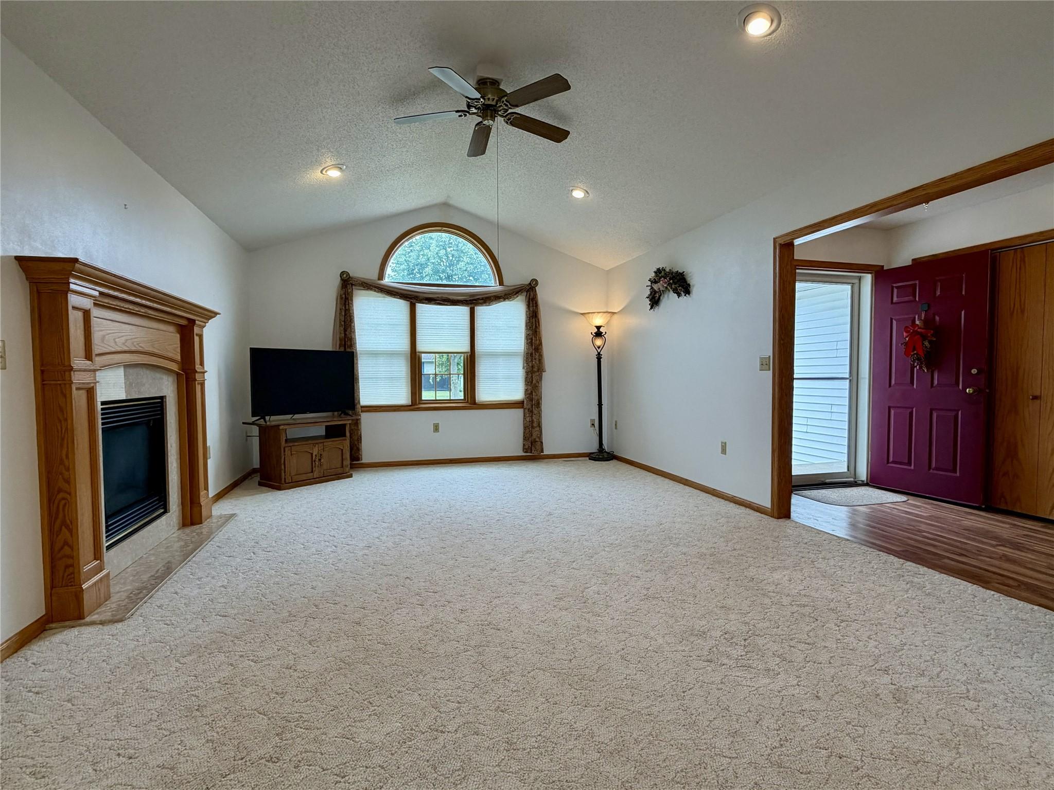 Image 2: Generously sized front living room with vaulted ce