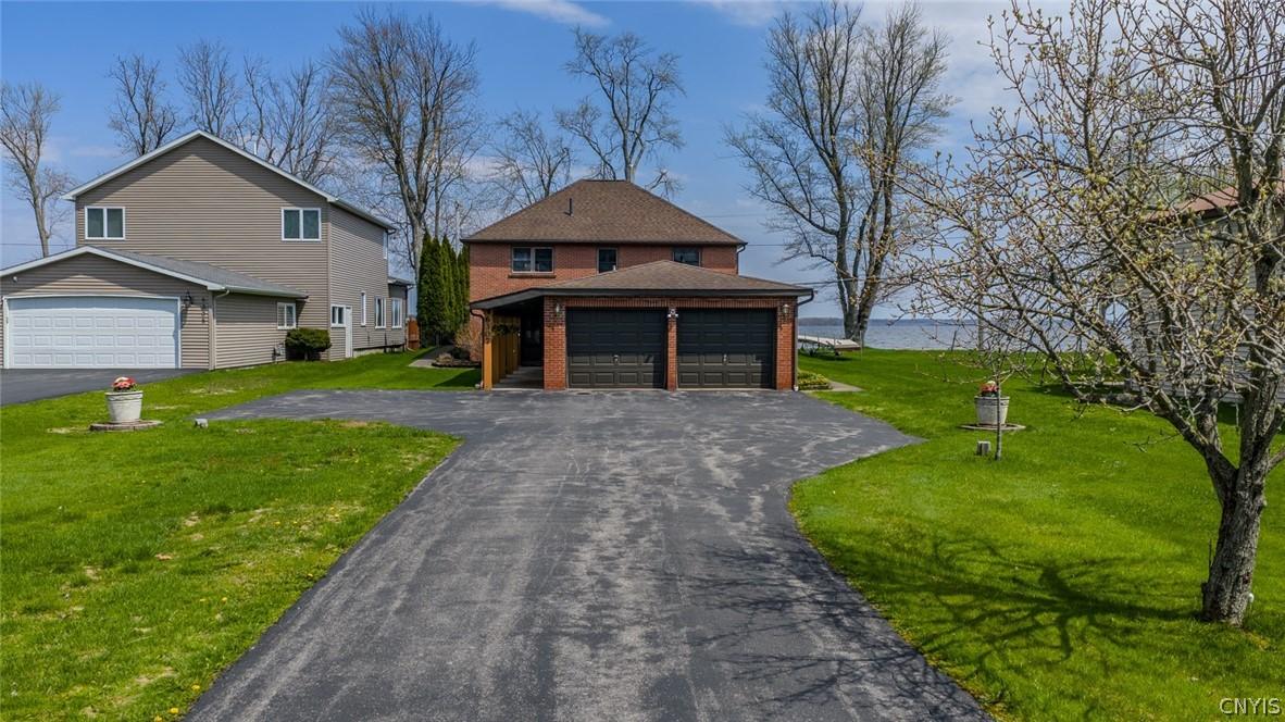 Image 3: Offering a 2 car garage with ample space for stora
