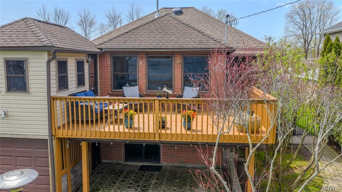Image 4: The rear deck connects the family room and three s
