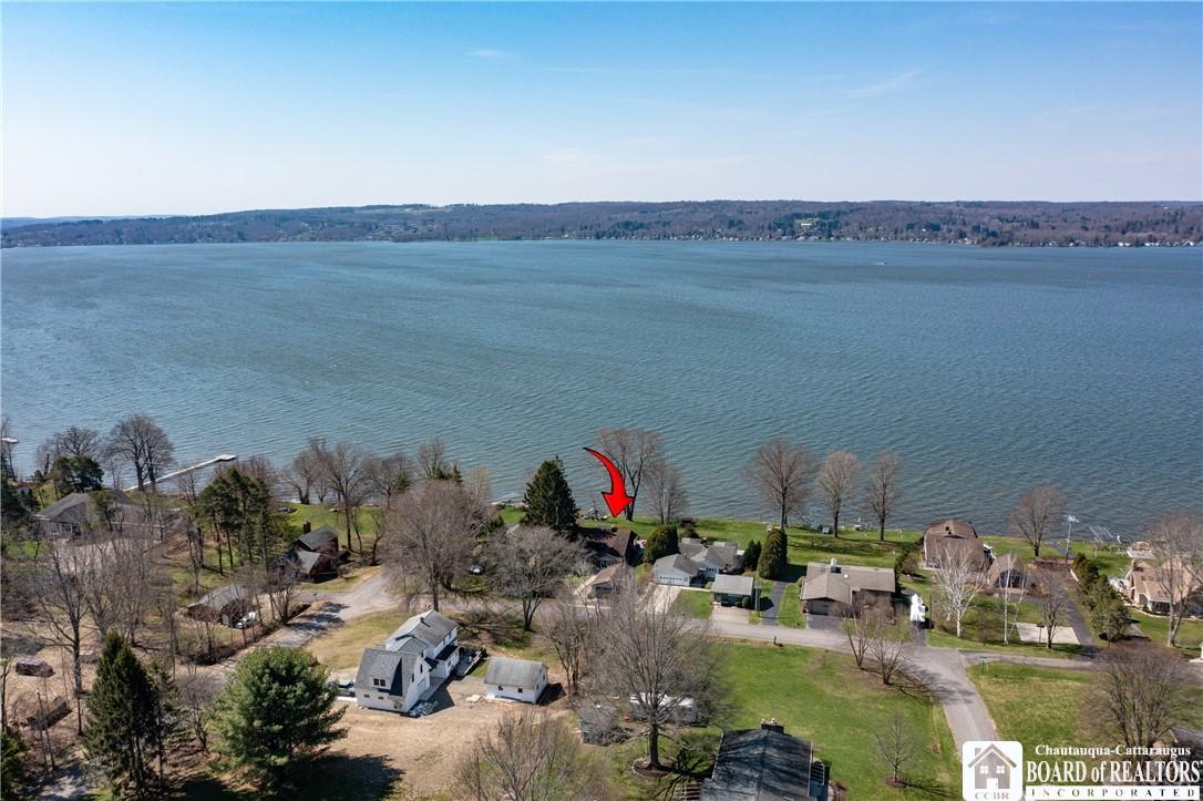 Image 2: Located along the Chautauqua Lake shoreline in bea