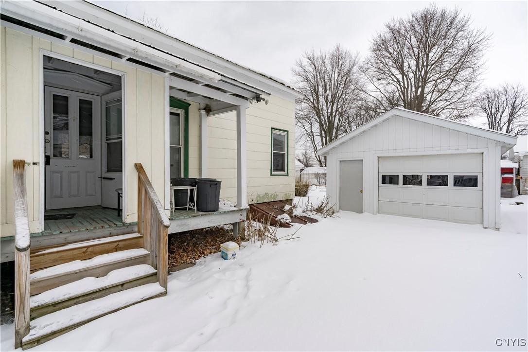 Image 2: Right Side Driveway and Garage