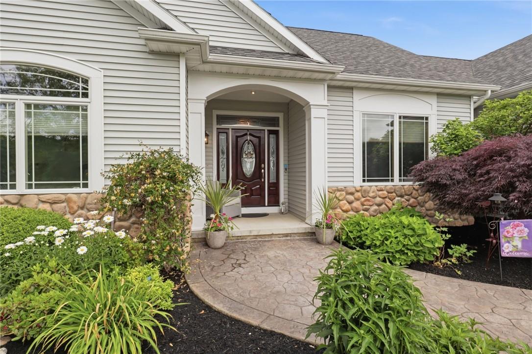 Image 2: This stunning property features beautiful, mature