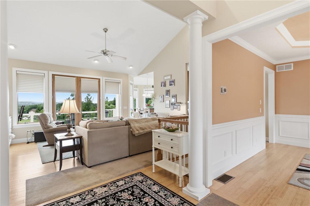 Image 4: Foyer opens to Formal Dining Room with Tray Ceilin