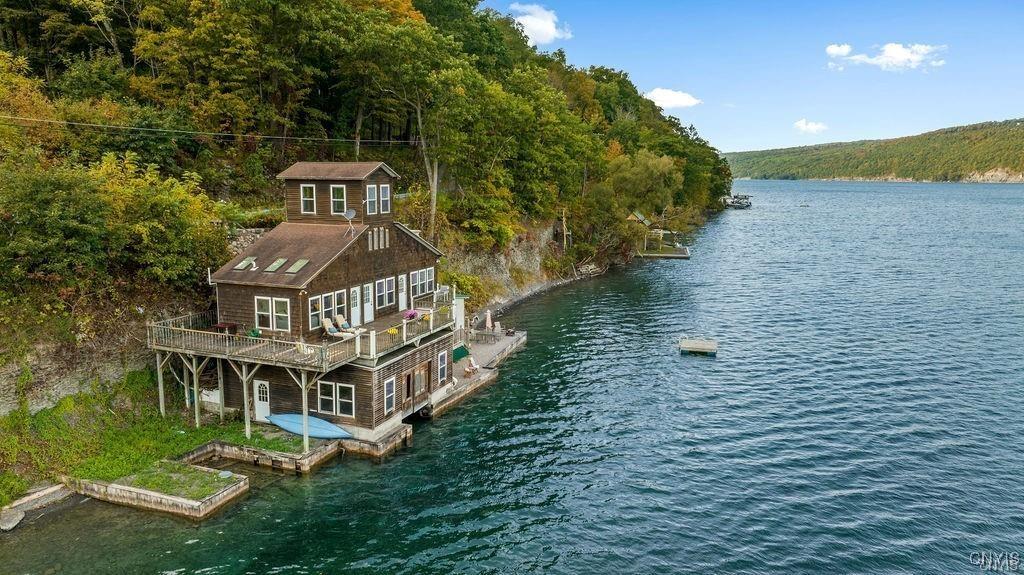 Image 1: Aerial waterside view