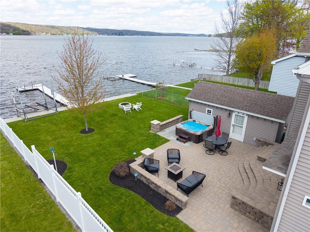 Image 3: Large spotless patio and lots of lawn for games.