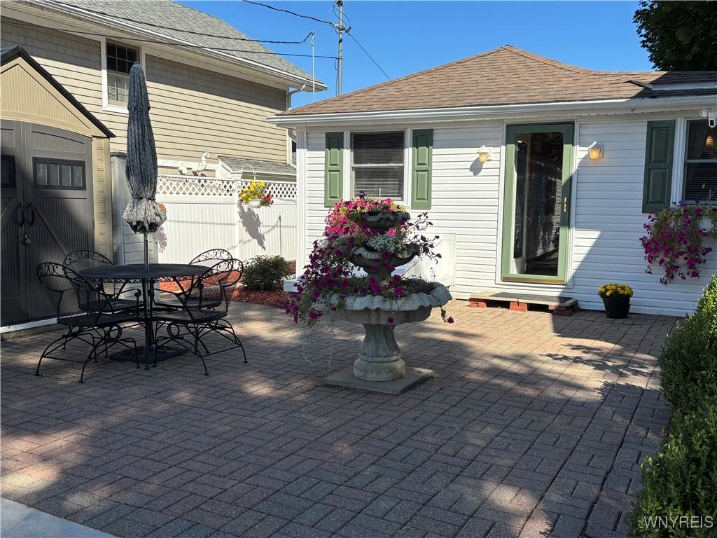 Image 2: Paver Courtyard with plenty of shed storage