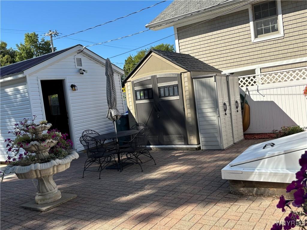 Image 3: Entrance to 1.5 car garage from rear man-door