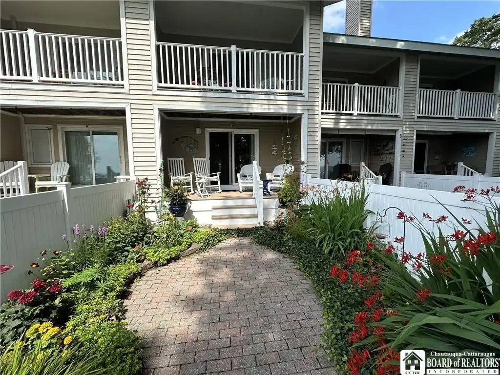 Image 1: Porch and Balcony overlooking the Lake