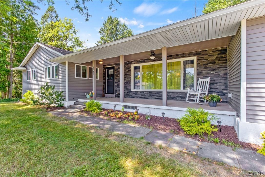 Image 3: Ceiling fan over the front porch.