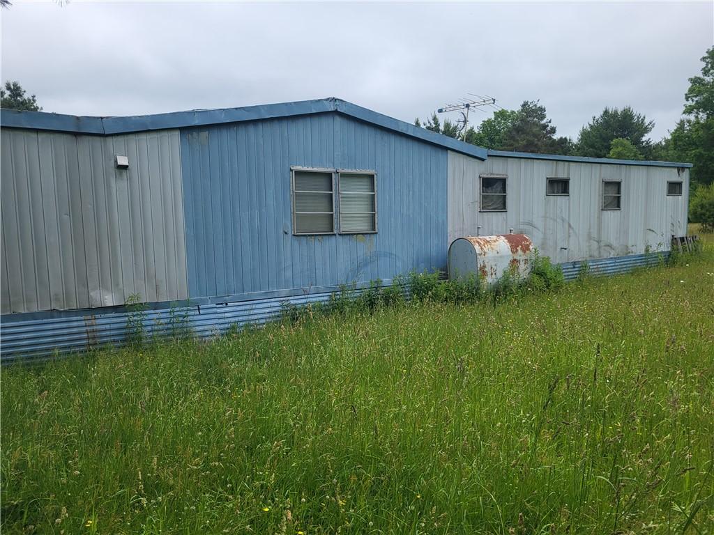 Image 2: side view of storage home