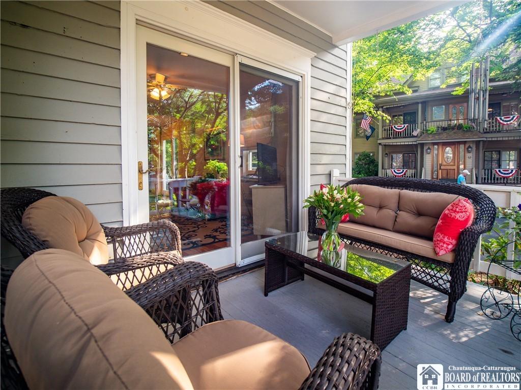 Image 3: Enjoy the summer on the porch! Rain or shine!