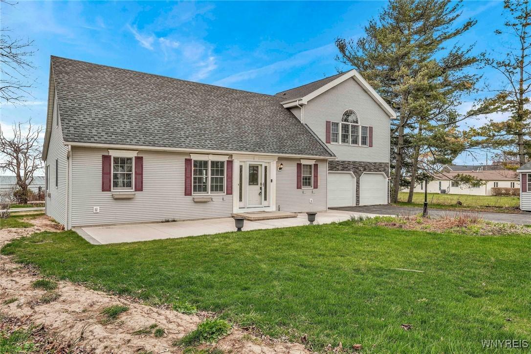 Image 3: Large concrete pad in front of house