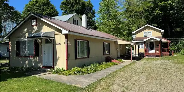 Image 2: Two homes on the property