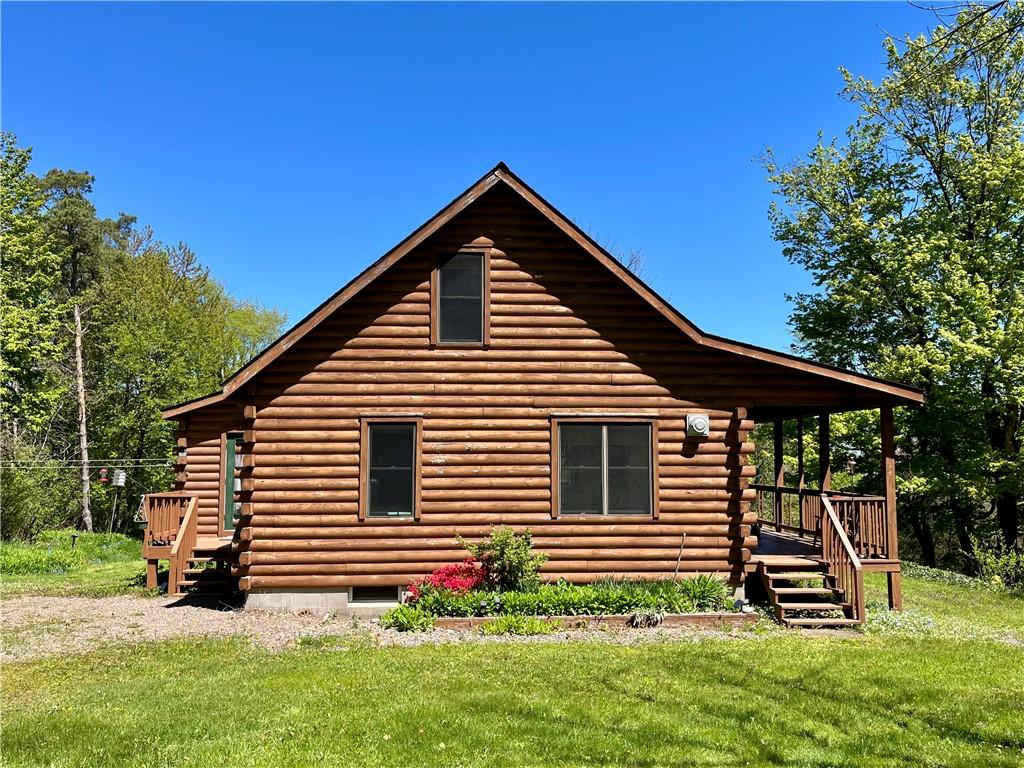 Image 2: This amazing log sided home was built in 1997 as a