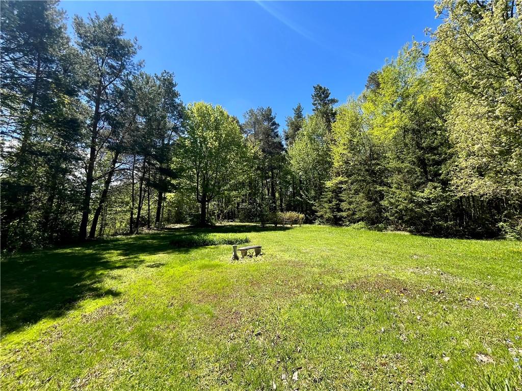 Image 4: Home is located at the top of a hill with scenic v