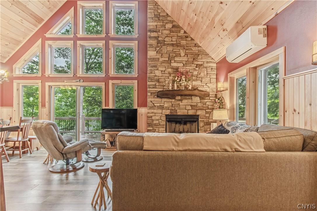 Image 3: Main floor with wood burning fireplace