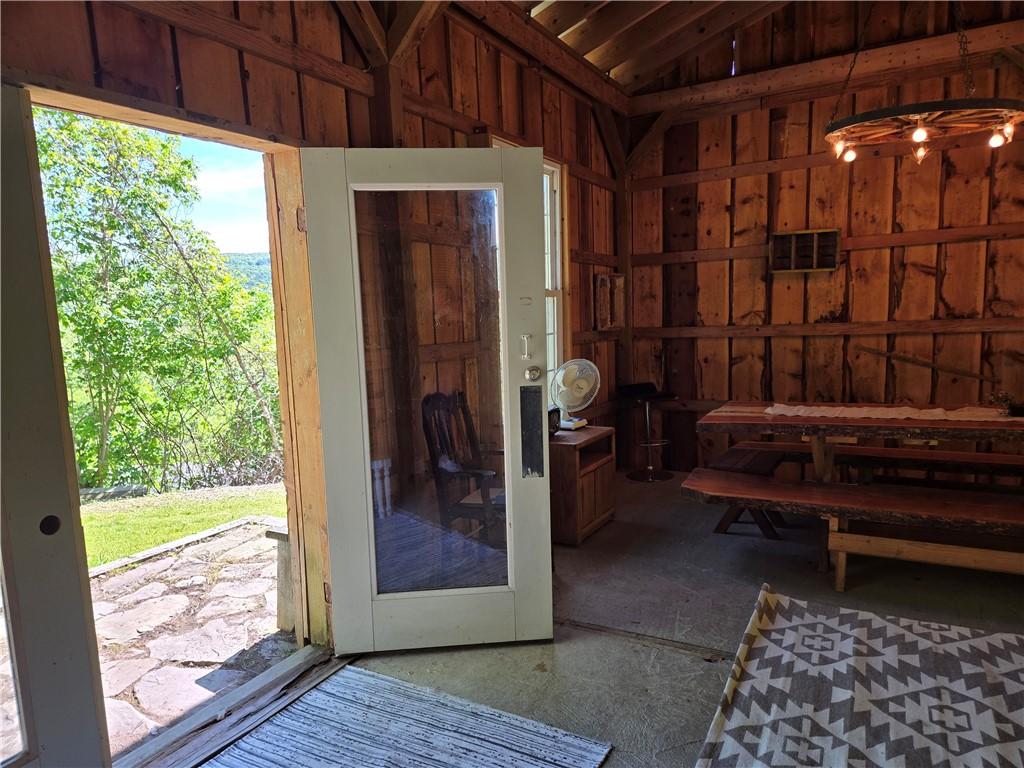 Image 3: Come on in and explore the main cabin with us.