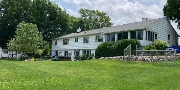 Image 2: Although the home looks like a simple ranch, the l