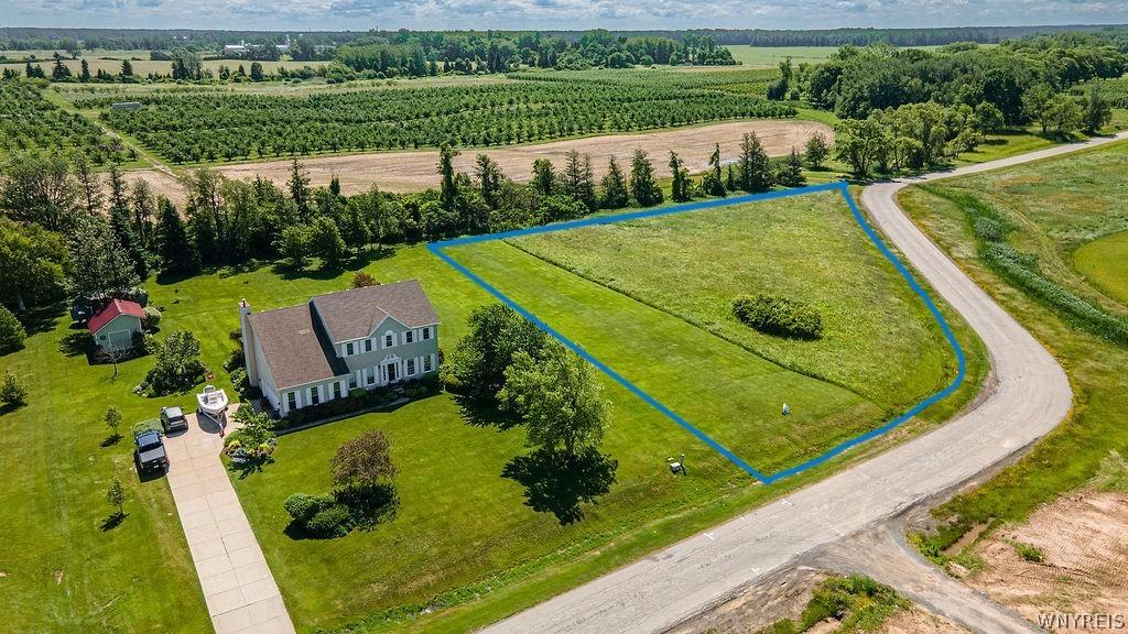 Image 3: First Lot on right entering subdivision