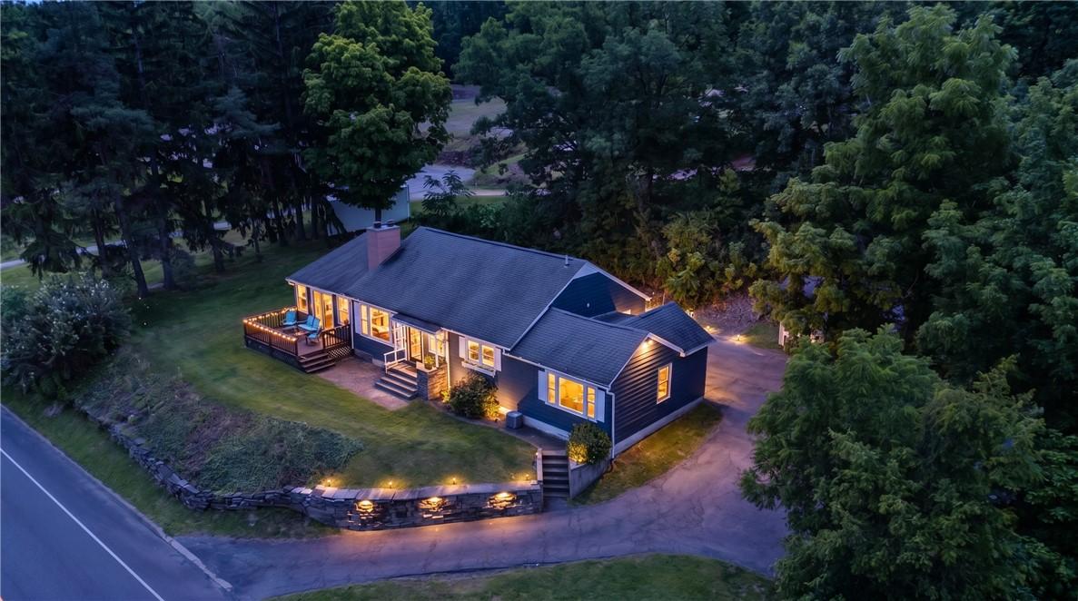 Image 2: Twilight Exterior- Warm Welcome Home