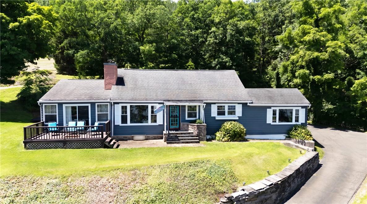Image 3: Beautiful front elevation featuring a driveway, ma