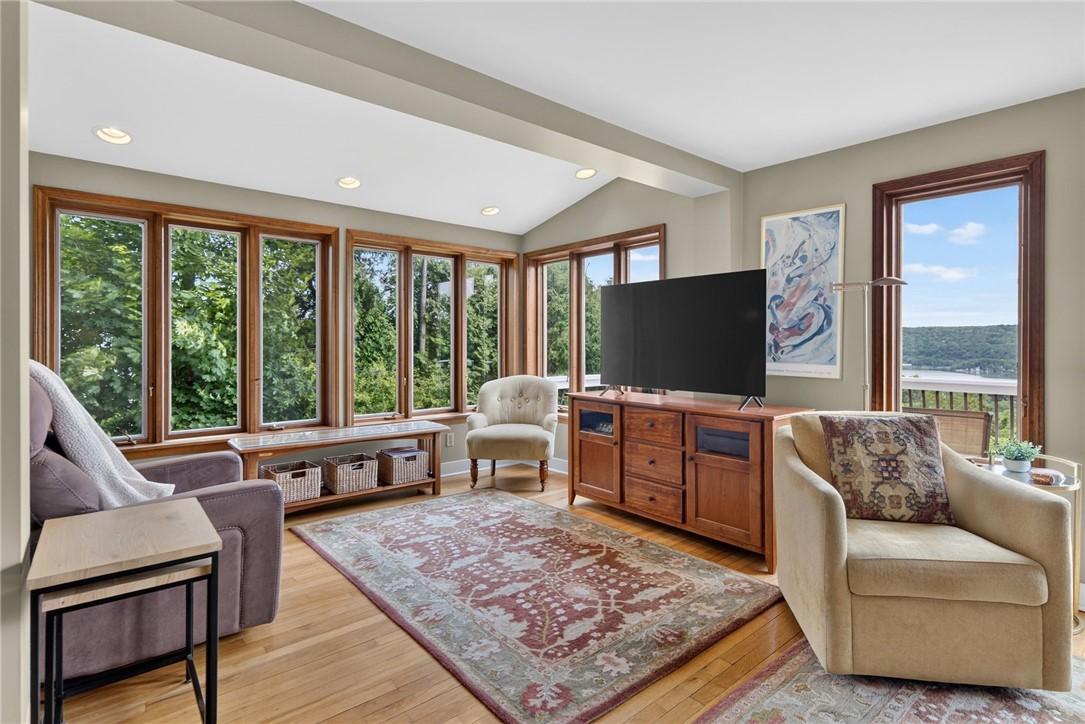 Image 3: open living with lake views