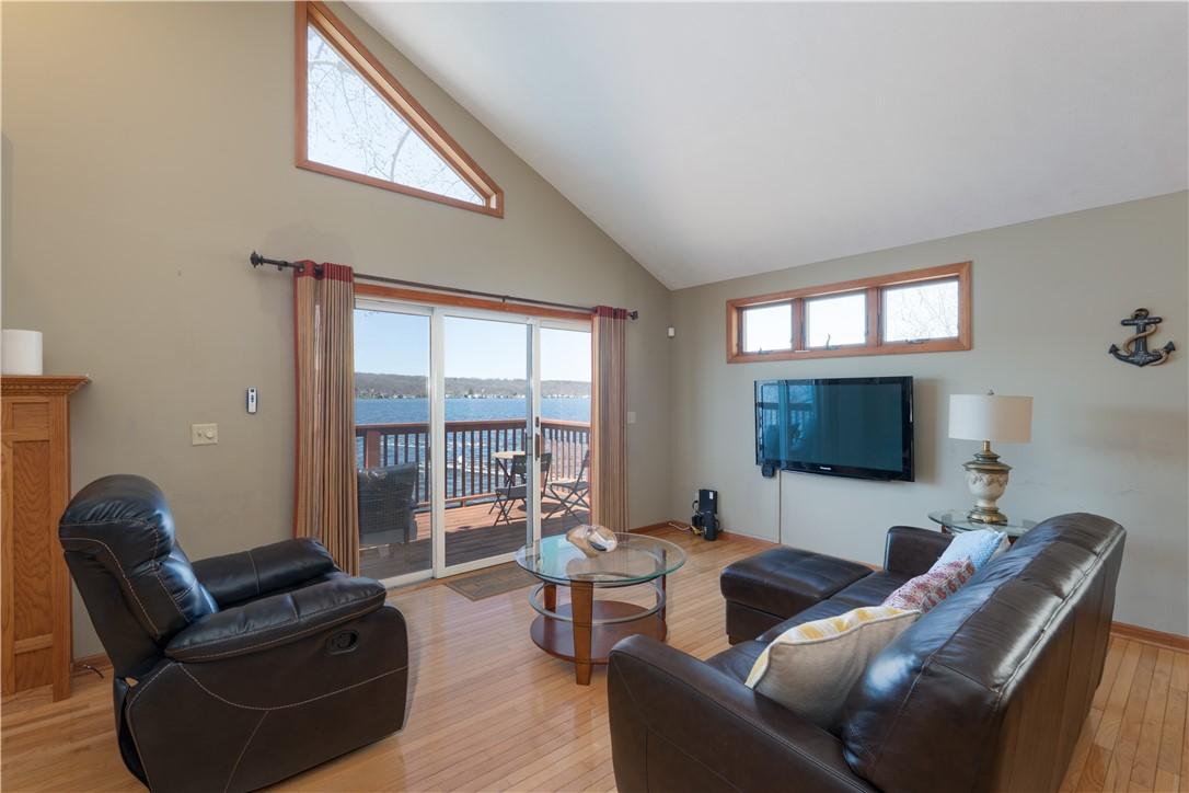Image 3: Lake views are abundant in this house!