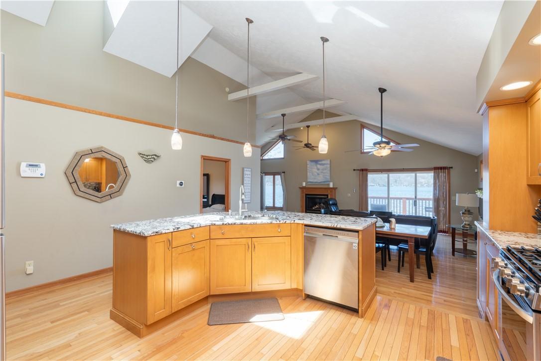 Image 4: Island with sink and dishwasher.