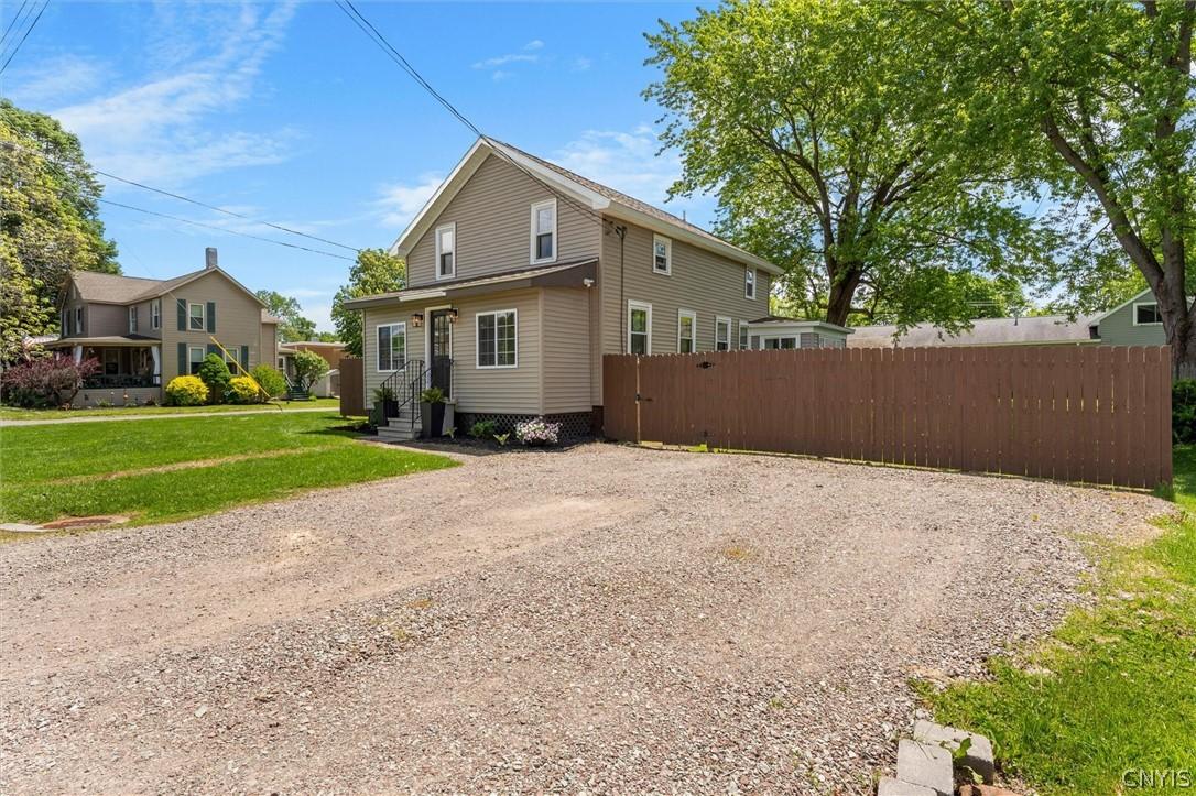 Image 4: Double-wide gravel driveway.